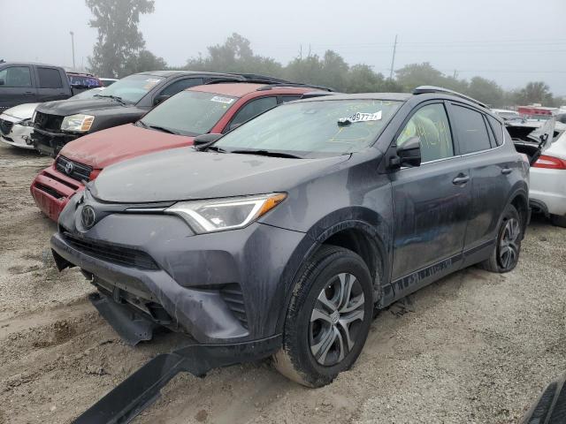 Photo 2 from auction – 2017 TOYOTA RAV4 LE with VIN JTMZFREV1HJ700730