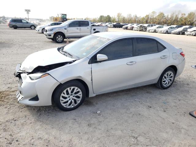 TOYOTA COROLLA L 2017 with VIN 5YFBURHE2HP693950 - Photo from auction