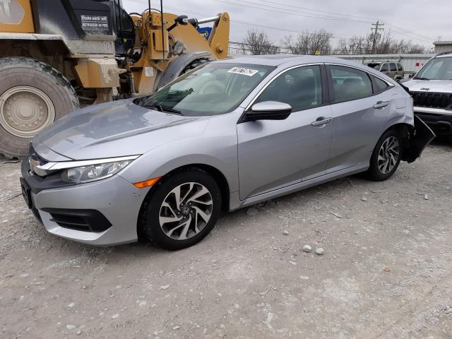 HONDA CIVIC EX 2018 with VIN 2HGFC2F71JH604141 - Photo from auction