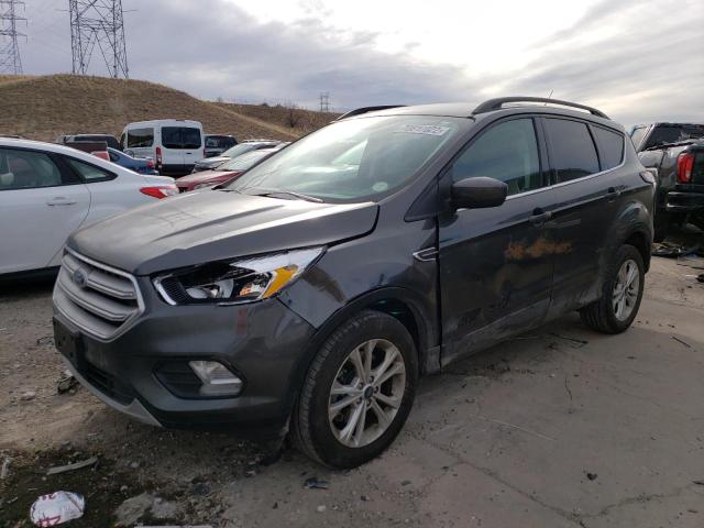 FORD ESCAPE SE 2018 with VIN 1FMCU9GD3JUD50744 - Photo from auction