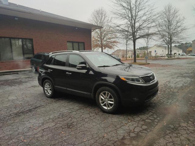 KIA SORENTO LX 2015 with VIN 5XYKT4A79FG597610 - Photo from auction