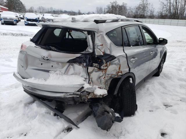 Photo 3 from auction – 2018 TOYOTA RAV4 LE with VIN JTMBFREV8JJ223401