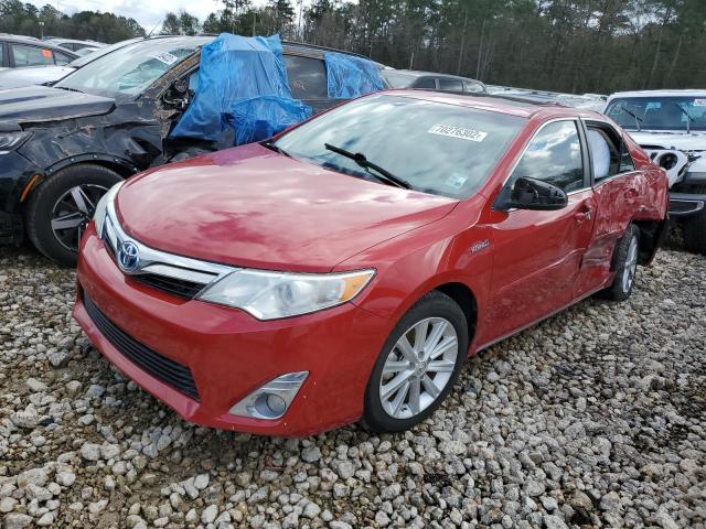 TOYOTA CAMRY HYBR 2014 with VIN 4T1BD1FK1EU112779 - Photo from auction