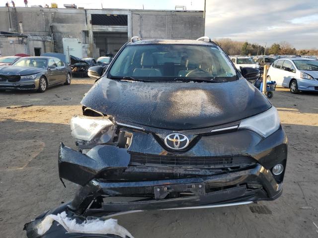 Photo 5 from auction – 2016 TOYOTA RAV4 XLE with VIN 2T3RFREVXGW528553