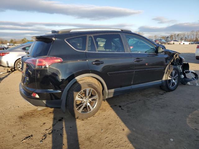 Photo 3 from auction – 2016 TOYOTA RAV4 XLE with VIN 2T3RFREVXGW528553