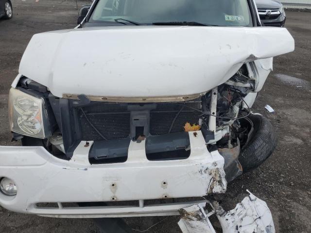 Photo 11 from auction – 2006 GMC ENVOY with VIN 1GKDT13S162131211