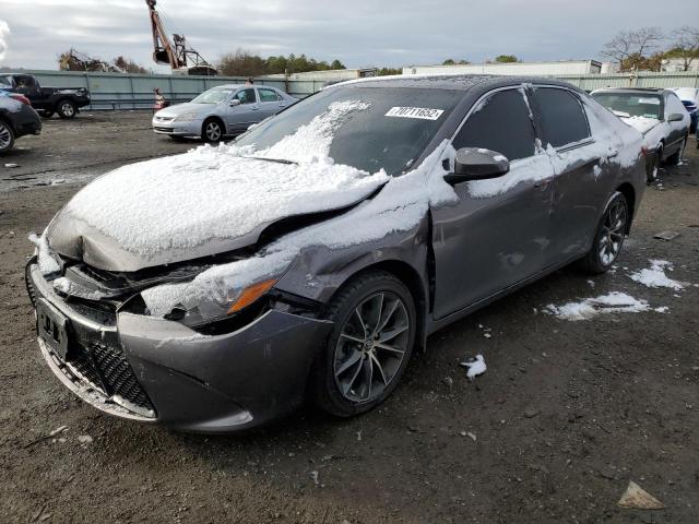 TOYOTA CAMRY LE 2017 with VIN 4T1BF1FK9HU758666 - Photo from auction
