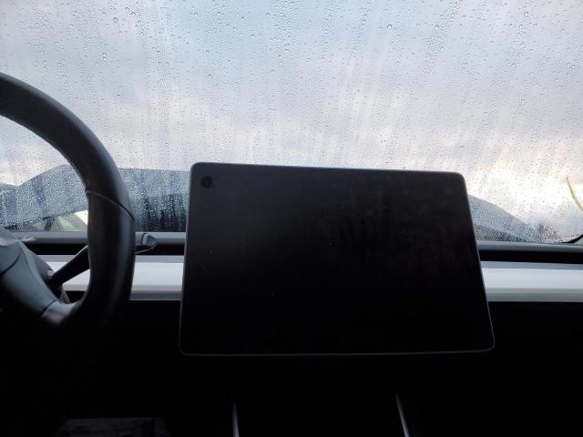 Photo 9 from auction – 2018 TESLA MODEL 3 with VIN 5YJ3E1EBXJF100950
