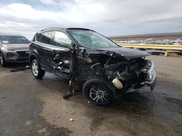 Photo 4 from auction – 2017 FORD ESCAPE SE with VIN 1FMCU9GD2HUC25941