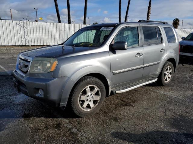 HONDA PILOT TOUR 2009 with VIN 5FNYF389X9B004268 - Photo from auction