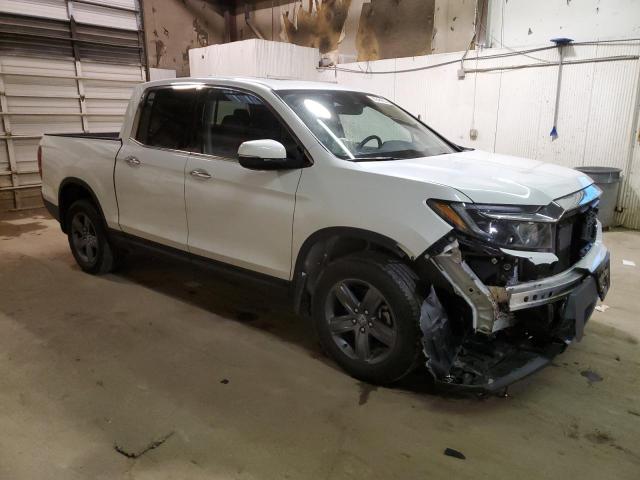 Photo 4 from auction – 2022 HONDA RIDGELINE with VIN 5FPYK3F73NB009360