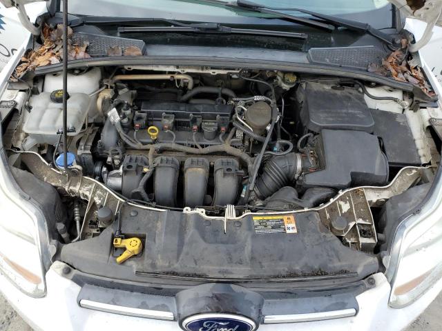 Photo 11 from auction – 2014 FORD FOCUS SE with VIN 1FADP3F27EL133485