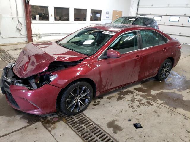 TOYOTA CAMRY LE 2016 with VIN 4T1BF1FK2GU590402 - Photo from auction