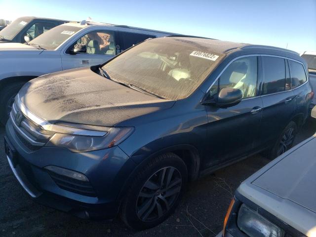 Photo 2 from auction – 2017 HONDA PILOT TOUR with VIN 5FNYF6H97HB041326