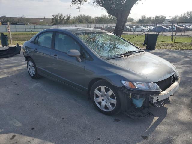 Photo 4 from auction – 2011 HONDA CIVIC LX with VIN 19XFA1F55BE027933