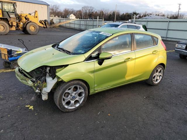 FORD FIESTA SES 2011 with VIN 3FADP4FJ6BM142363 - Photo from auction