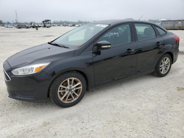 FORD FOCUS SE 2017 with VIN 1FADP3F23HL215203 - Photo from auction