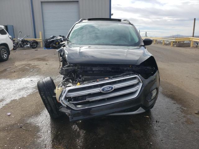 Photo 5 from auction – 2017 FORD ESCAPE SE with VIN 1FMCU9GD2HUC25941