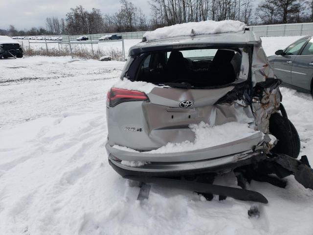 Photo 6 from auction – 2018 TOYOTA RAV4 LE with VIN JTMBFREV8JJ223401