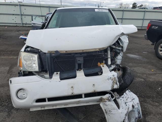 Photo 5 from auction – 2006 GMC ENVOY with VIN 1GKDT13S162131211