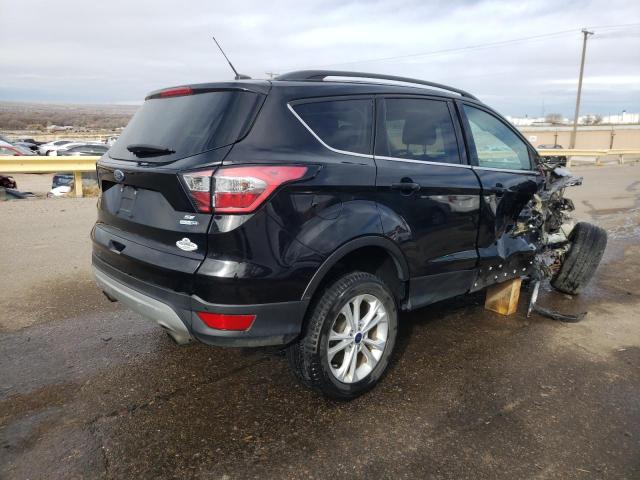 Foto 3 de la subasta – 2017 FORD ESCAPE SE con VIN 1FMCU9GD2HUC25941