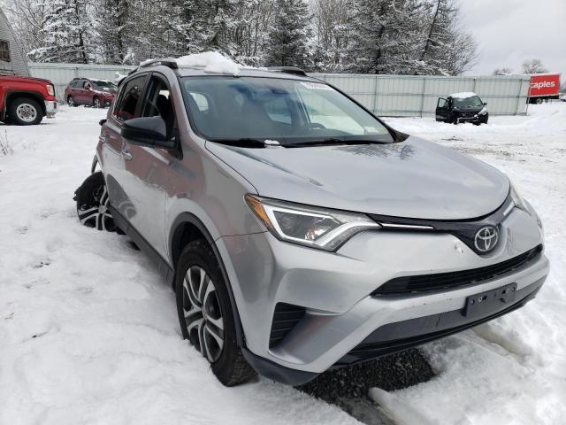 Photo 4 from auction – 2018 TOYOTA RAV4 LE with VIN JTMBFREV8JJ223401
