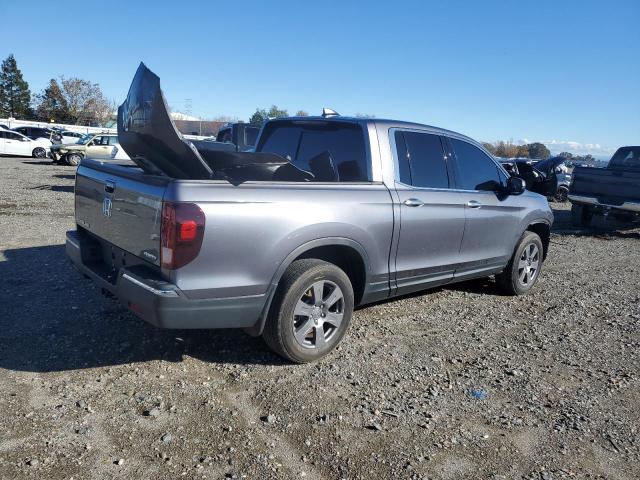 Photo 3 from auction – 2020 HONDA RIDGELINE with VIN 5FPYK3F76LB012864
