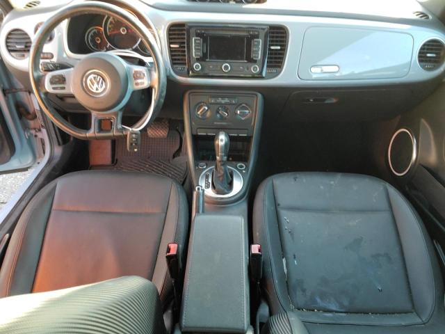 Photo 8 from auction – 2014 VOLKSWAGEN BEETLE with VIN 3VW5L7ATXEM820540