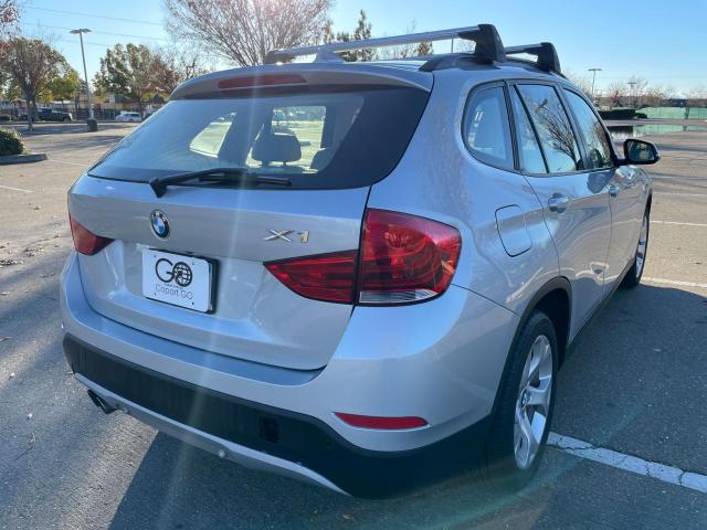 Photo 4 from auction – 2015 BMW X1 SDRIVE2 with VIN WBAVM1C53FV316945