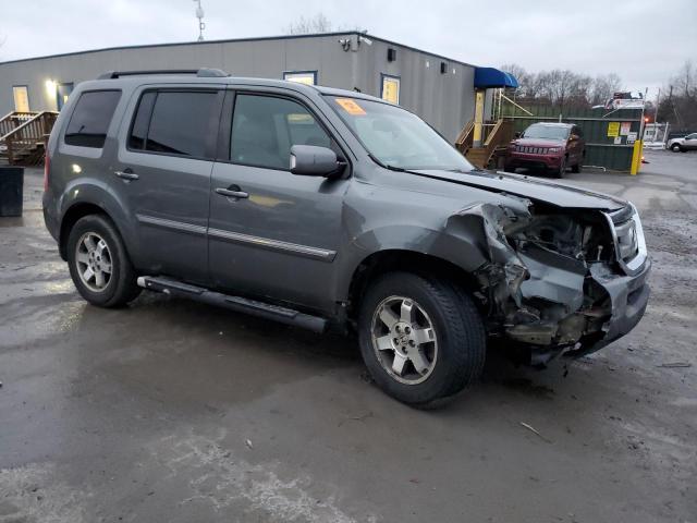 Photo 4 from auction – 2011 HONDA PILOT TOUR with VIN 5FNYF4H9XBB059251