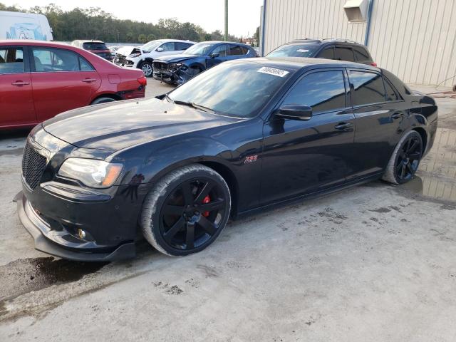 CHRYSLER 300 SRT-8 2013 with VIN 2C3CCAFJXDH599084 - Photo from auction