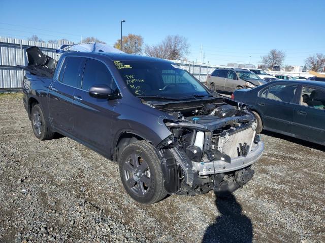 Photo 4 from auction – 2020 HONDA RIDGELINE with VIN 5FPYK3F76LB012864