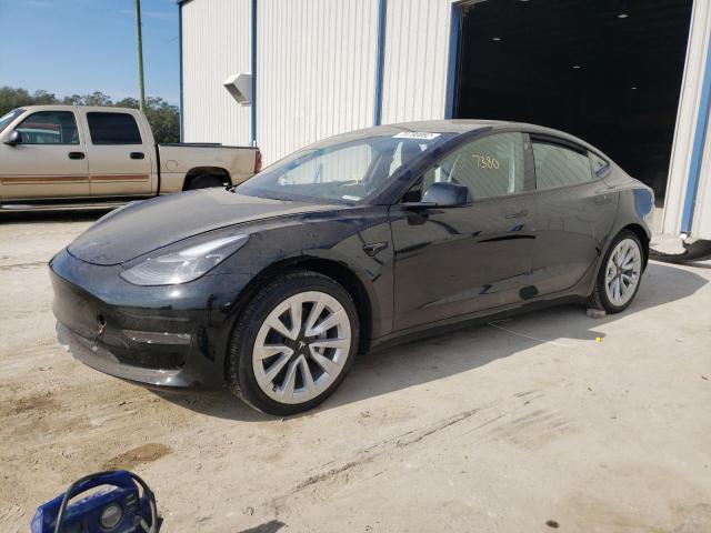 TESLA MODEL 3 2022 with VIN 5YJ3E1EB0NF263841 - Photo from auction