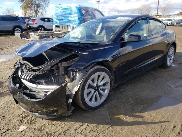 TESLA MODEL 3 2022 with VIN 5YJ3E1EB9NF186497 - Photo from auction
