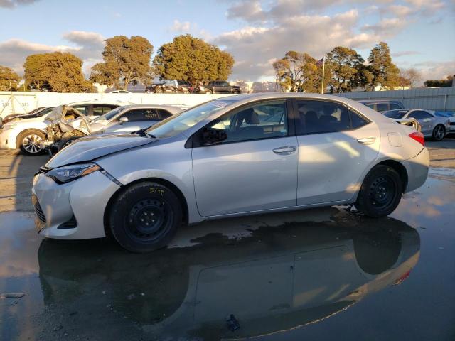 TOYOTA COROLLA L 2019 with VIN 2T1BURHE1KC189882 - Photo from auction