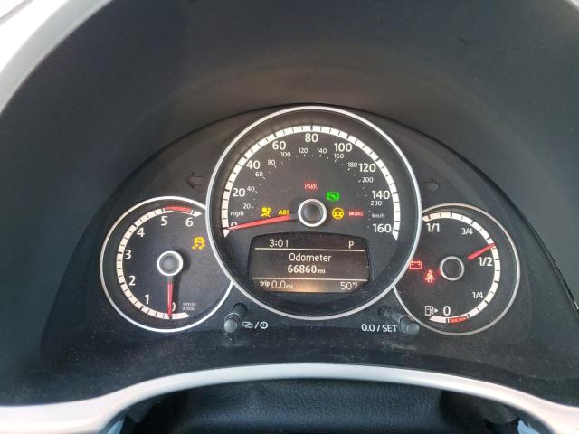 Photo 9 from auction – 2014 VOLKSWAGEN BEETLE with VIN 3VW5L7ATXEM820540
