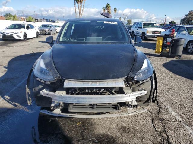 Photo 5 from auction – 2022 TESLA MODEL Y with VIN 7SAYGDEFXNF350315