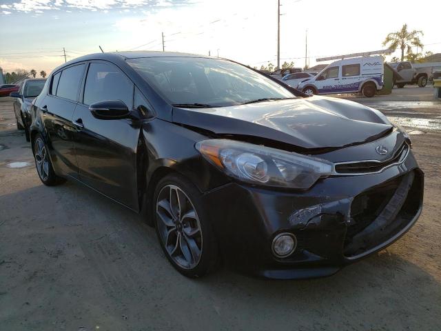 Photo 4 from auction – 2015 KIA FORTE SX with VIN KNAFZ5A3XF5404437