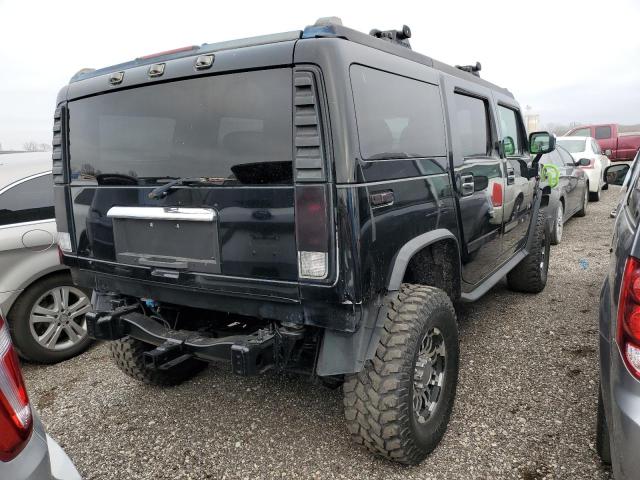 Photo 4 from auction – 2003 HUMMER H2 with VIN 5GRGN23U23H132577