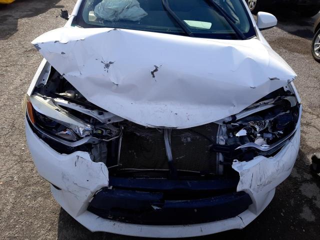 Photo 11 from auction – 2014 TOYOTA COROLLA L with VIN 5YFBURHE5EP123078