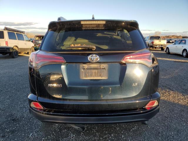 Photo 6 from auction – 2017 TOYOTA RAV4 LE with VIN JTMZFREV8HD097659