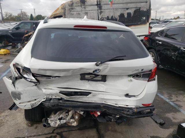 Photo 6 from auction – 2015 BMW X1 SDRIVE2 with VIN WBAVM1C54FVW57707