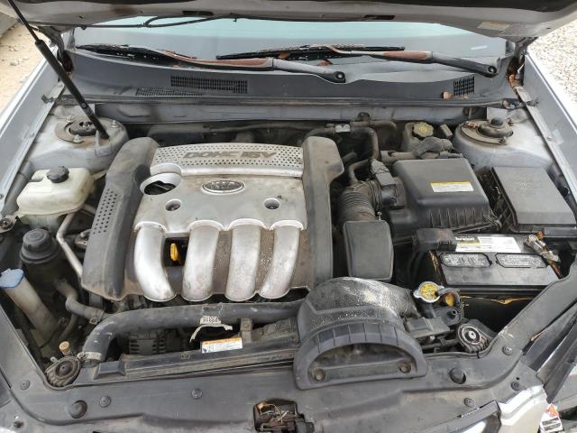 Photo 11 from auction – 2006 KIA OPTIMA LX with VIN KNAGE123065030542