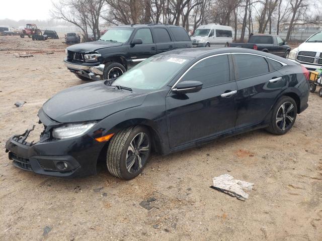 Photo 1 from auction – 2017 HONDA CIVIC TOUR with VIN 19XFC1F95HE024844