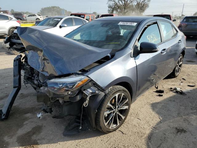 TOYOTA COROLLA L 2019 with VIN 5YFBURHE9KP945670 - Photo from auction