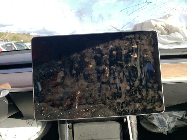 Photo 9 from auction – 2021 TESLA MODEL Y with VIN 5YJYGDEE3MF077236
