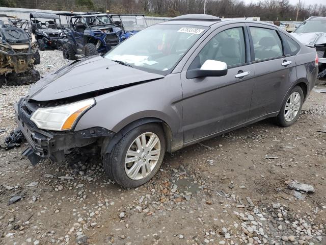 FORD FOCUS 2011 with VIN 1FAHP3HN2BW169295 - Photo from auction