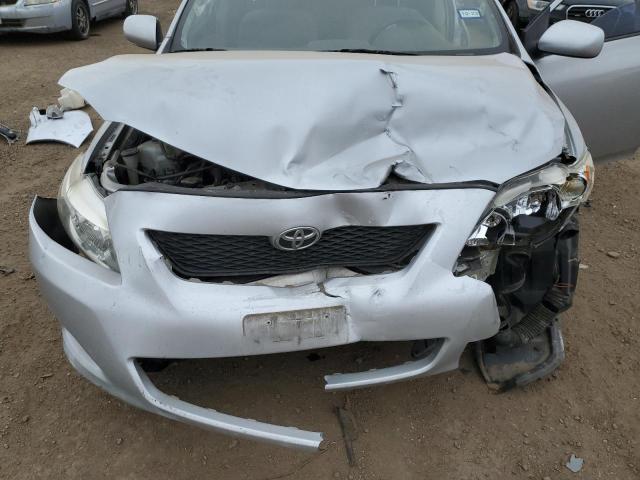 Photo 11 from auction – 2009 TOYOTA CAROLLA with VIN JTDBL40E99J014487