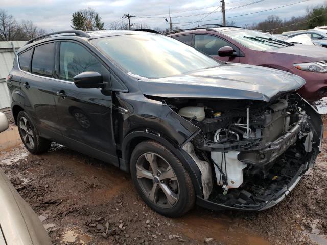Photo 4 from auction – 2017 FORD ESCAPE SE with VIN 1FMCU9GD7HUD71414