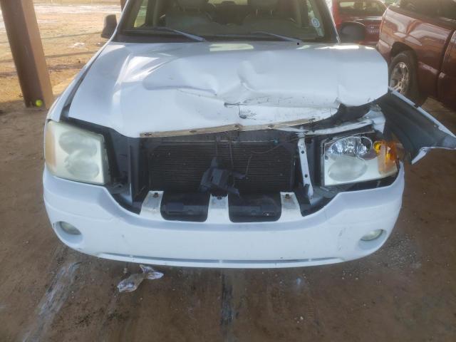 Photo 12 from auction – 2002 GMC ENVOY with VIN 1GKDS13S522409122